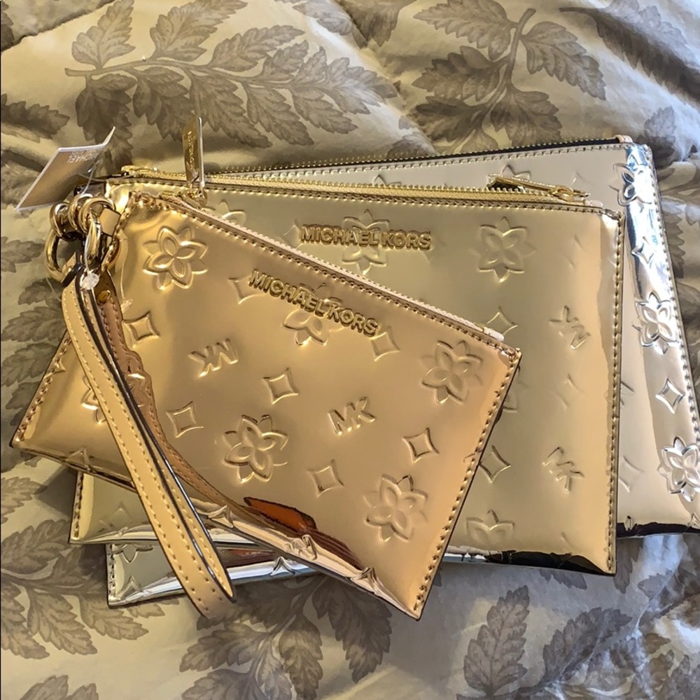 Michael Kors wristlet trio